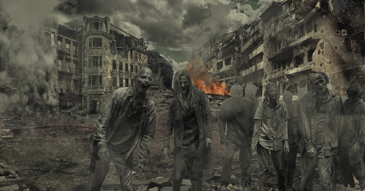 Zombies walking in a destroyed city landscape.