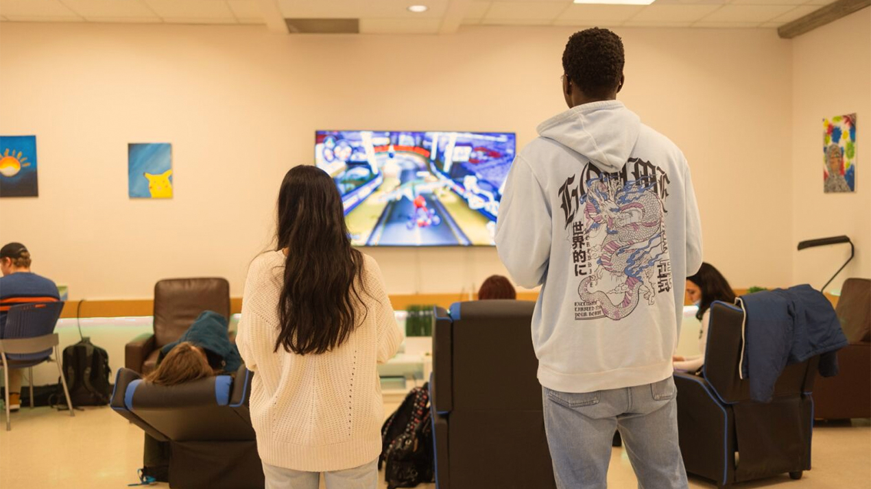 students gaming in the wellness lounge
