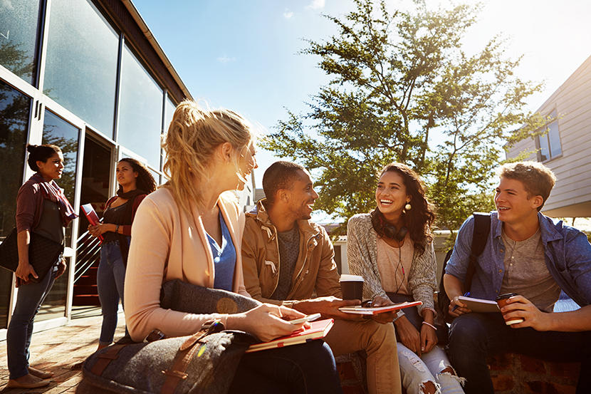 Group of students talking and laughing