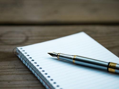 A pen on a book