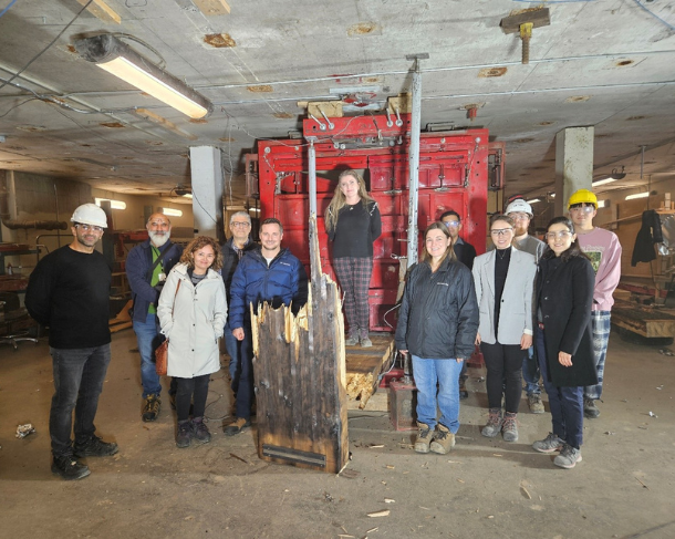 Professor Ghasan Doudak with his graduate students facing the camera.