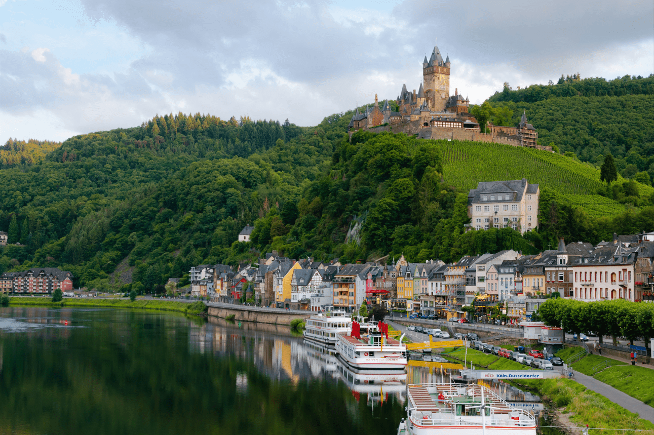 View of medieval buildings and castle on a hill