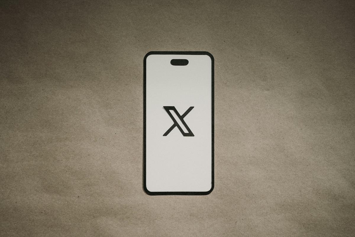 Social media app X displayed on a mobile phone