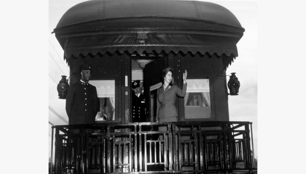 A Black Porter at the back of a Canadian train with then Princess Elizabeth