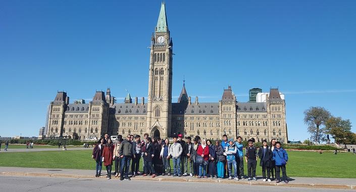 Intensive program international students discovering Canadian culture at Parliament.