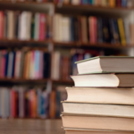 A pile of books on a table 