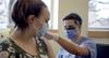 resident give vaccine