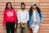 Group of diverse friends standing in front of wall