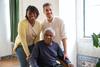 Elderly man with two young people