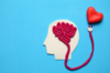 Blue background with a sketch of the brain and the heart connected