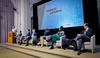 Academics from around the globe discussing AI legislation in a panel.