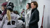 MK Marsden behind the bench of a Gee-Gees women's hockey game