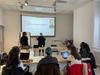 Students attending a class presentation.