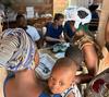Juliette Thibaudeau helps care for patients at a clinic in Benin while on an internship.