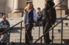Two students on stairs in front of Tabaret
