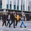 Group of students walking on campus