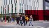 Group of students walking on campus