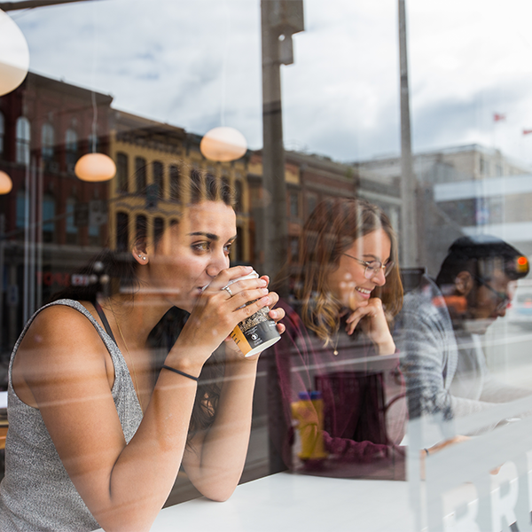 person drinking a coffee