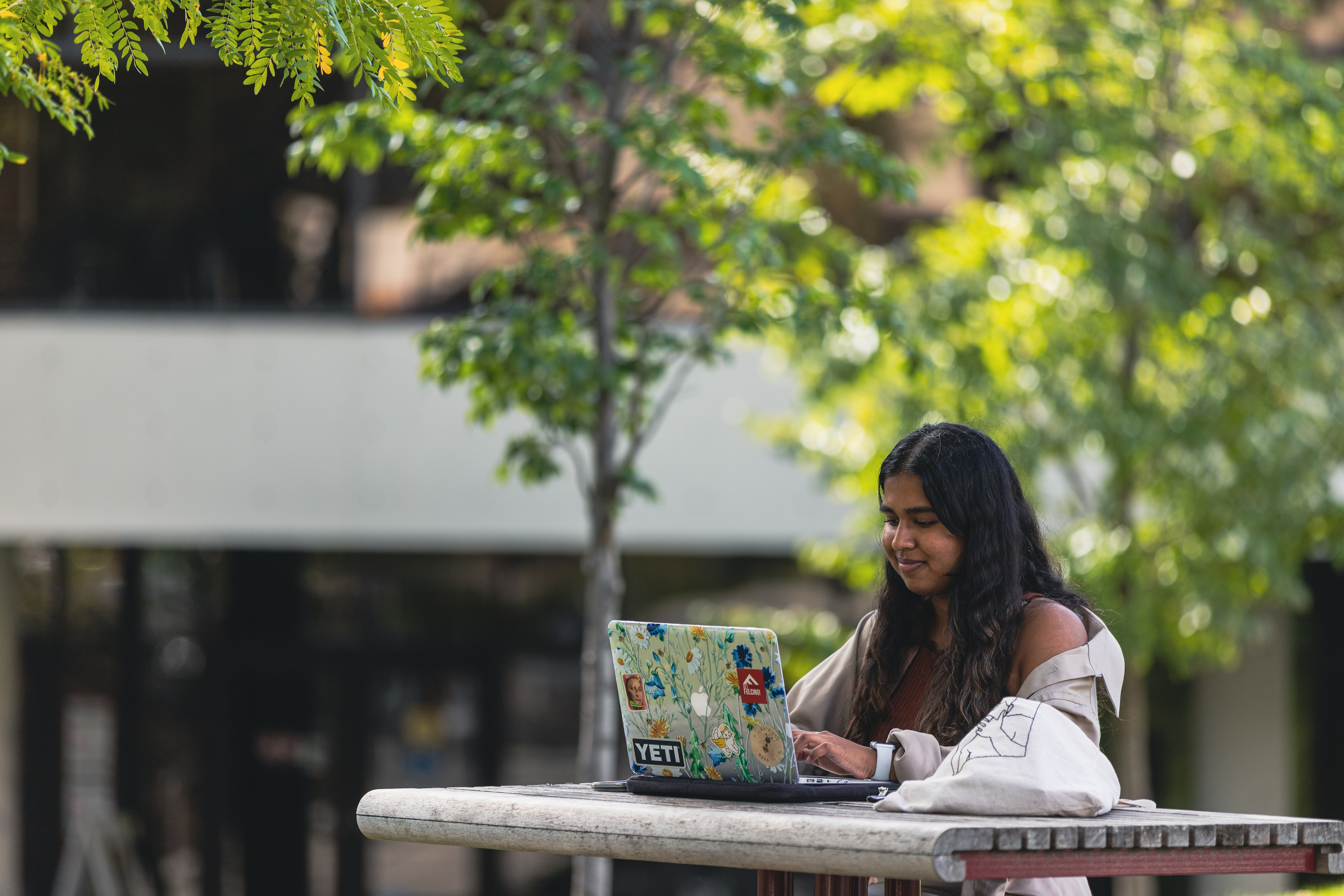 student sitting outside