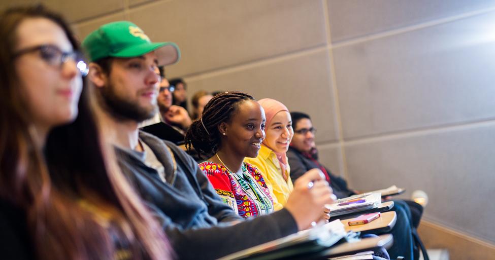 row of sitting students in a classroom