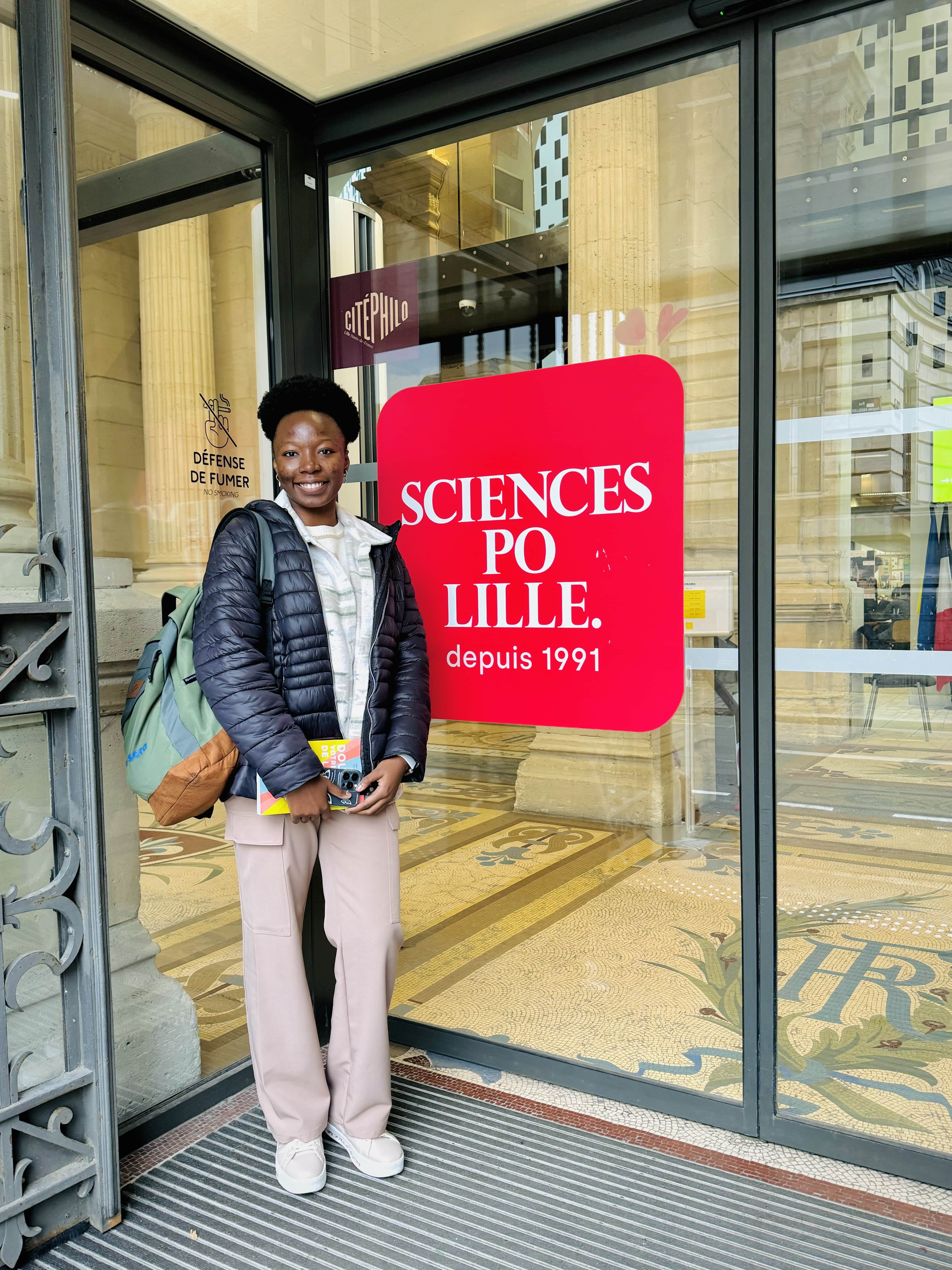 Student in front of Sciences Po Lille building