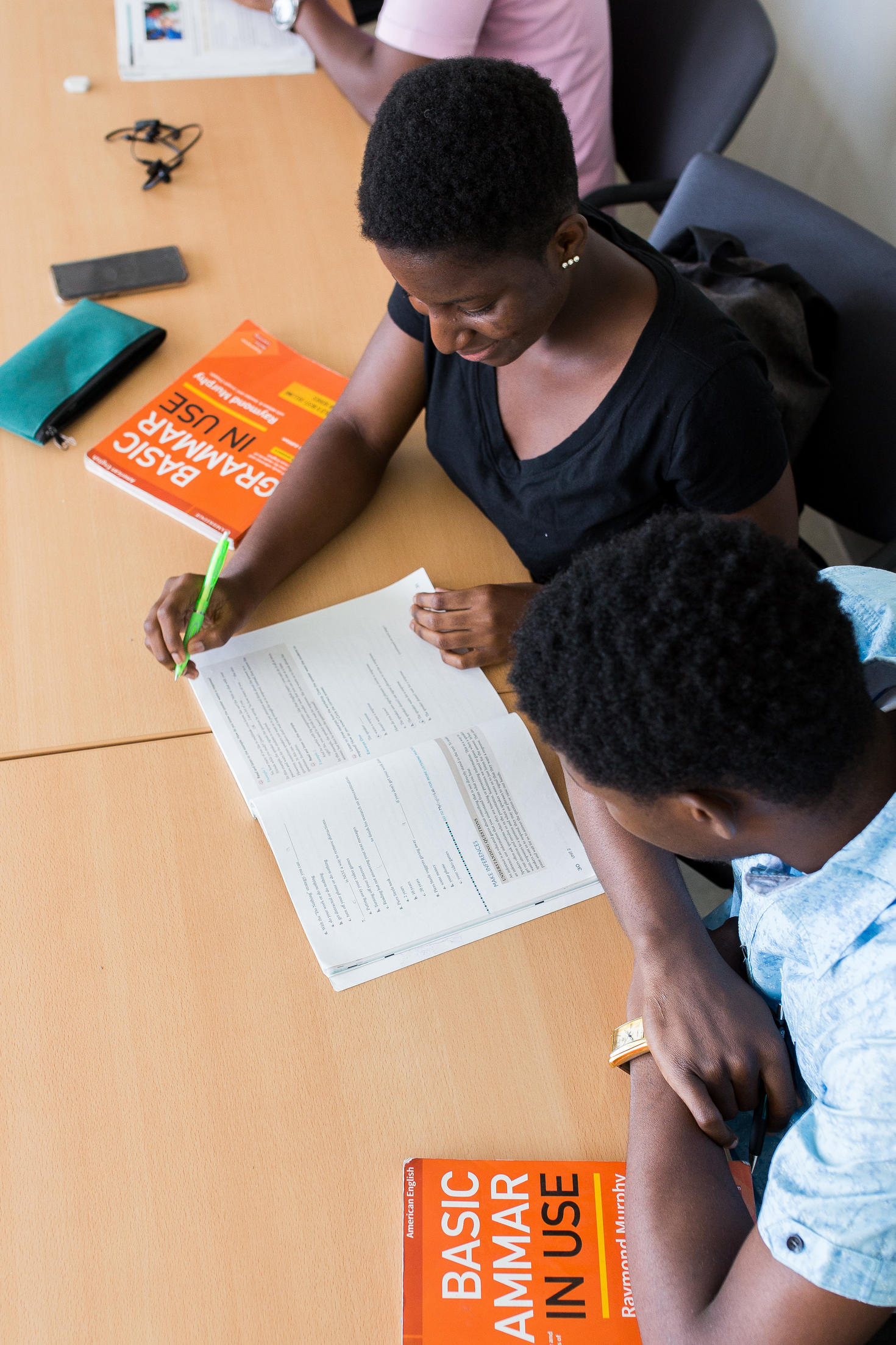 Two students with opened books