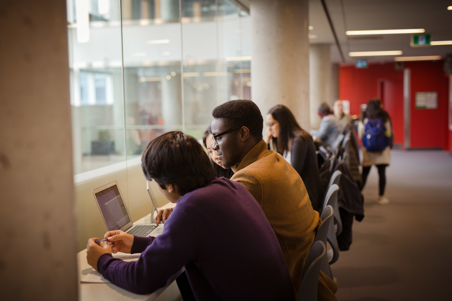 students in front of a computer