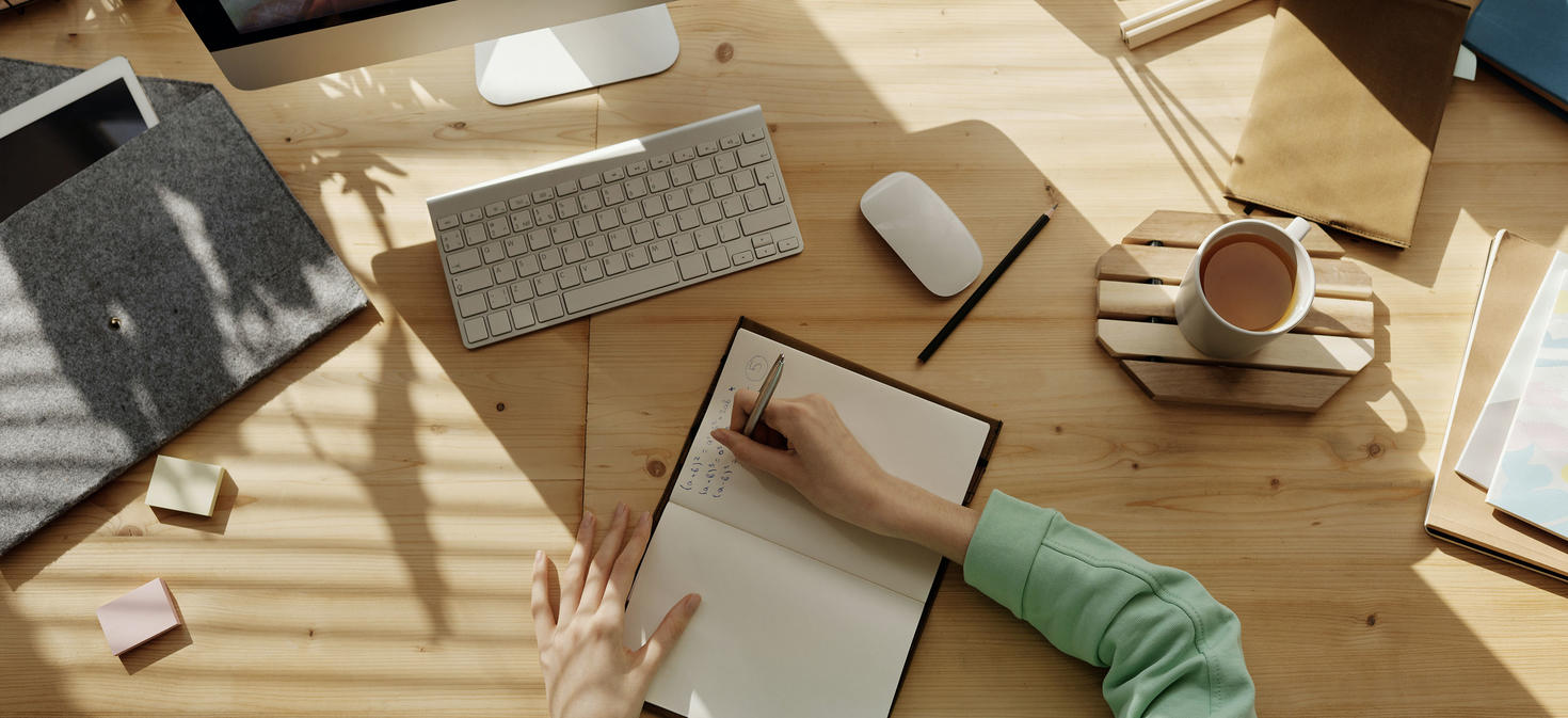 student working at a desk