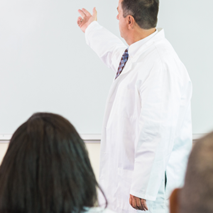 Professor giving a lecture to a class of students