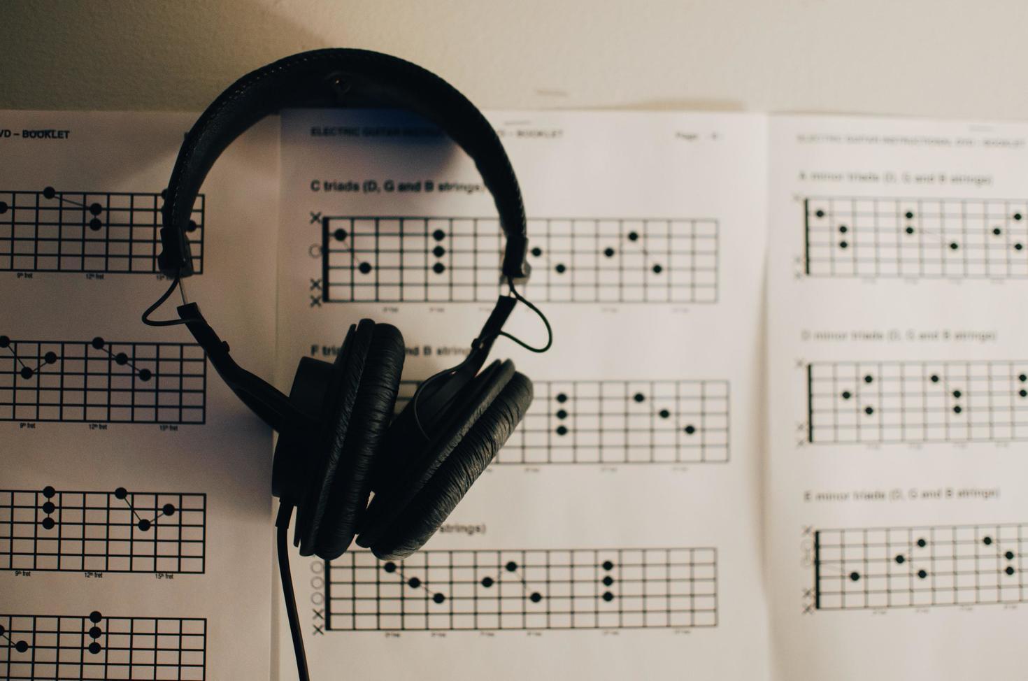 headphones on sheet music