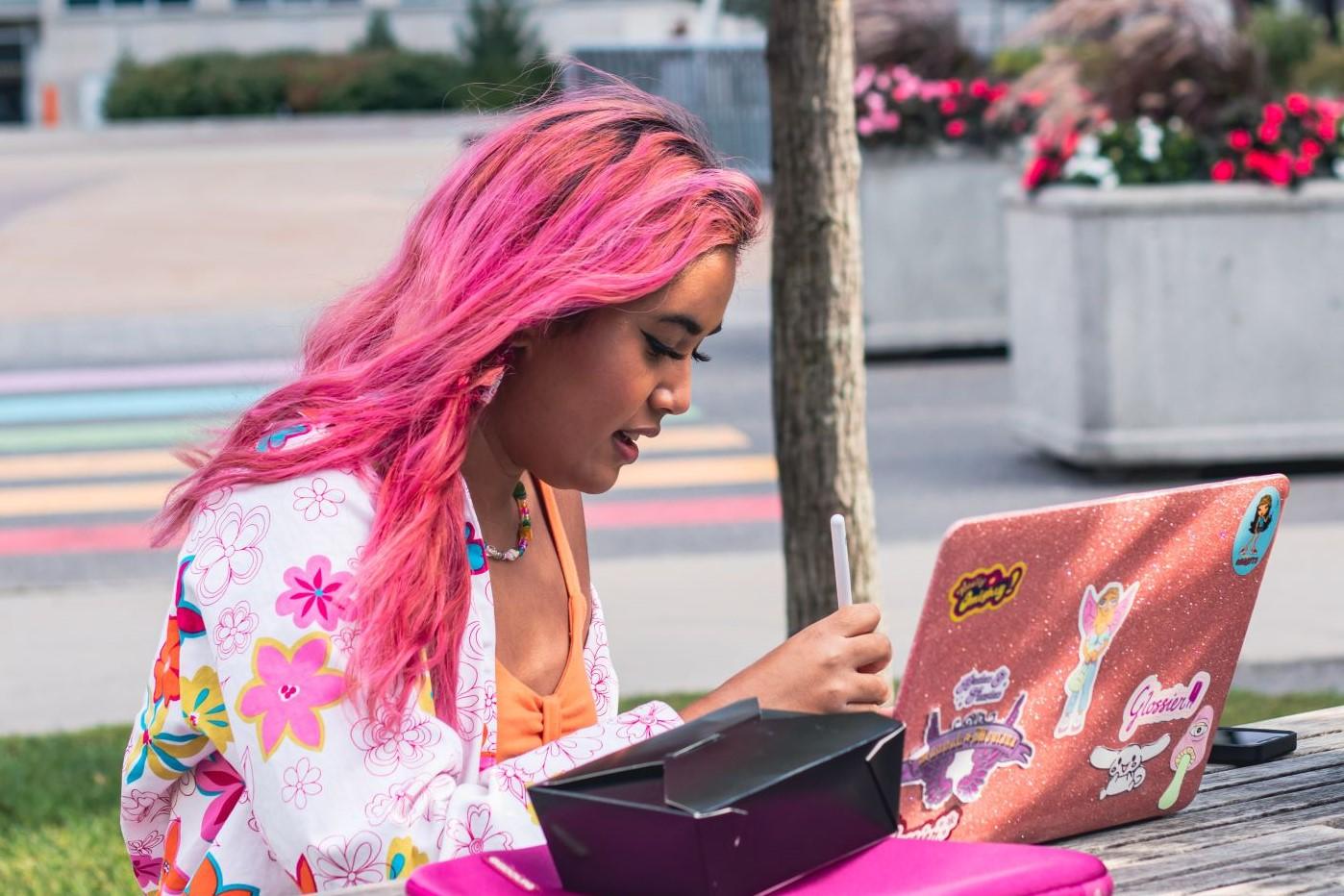 student in front of a computer