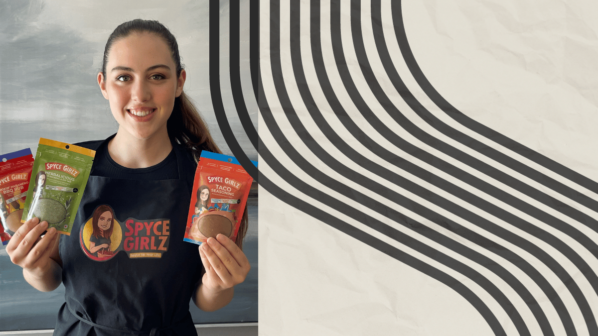 Lily Bond, Founder of Spyce Girlz, holding 3 types of spice products.