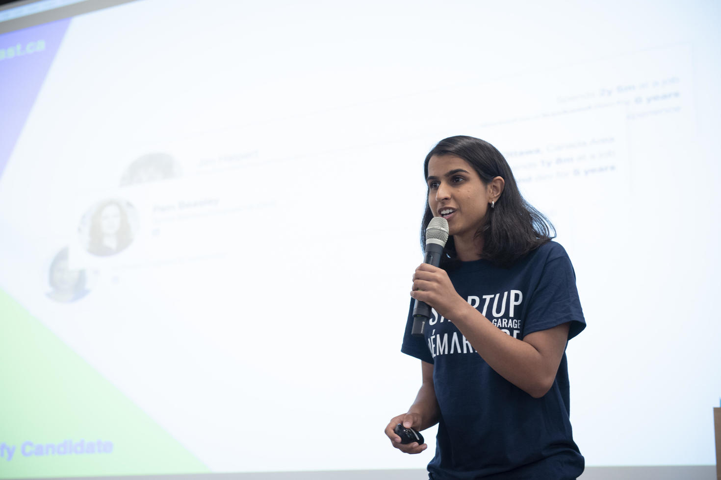Student presenting with microphone