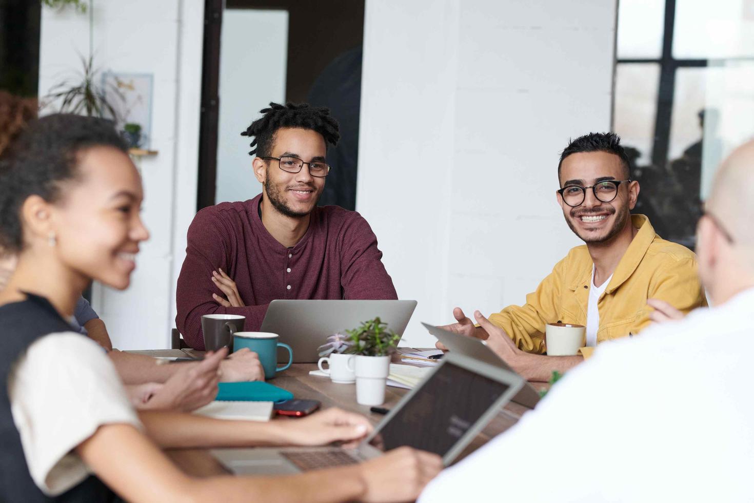 students talking at a table