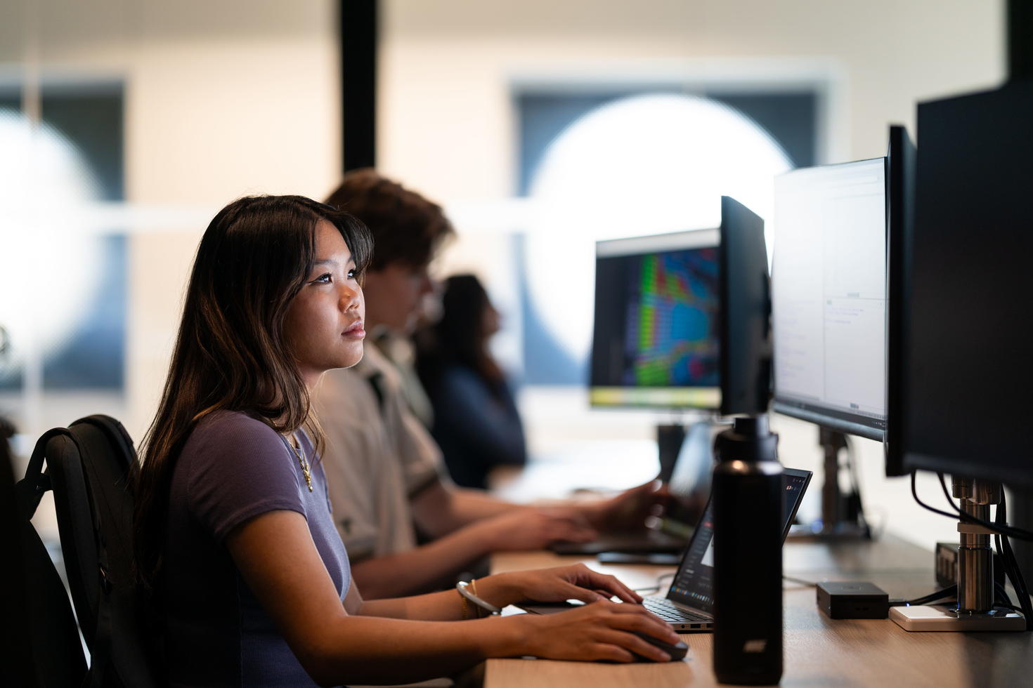 Two students working at computers