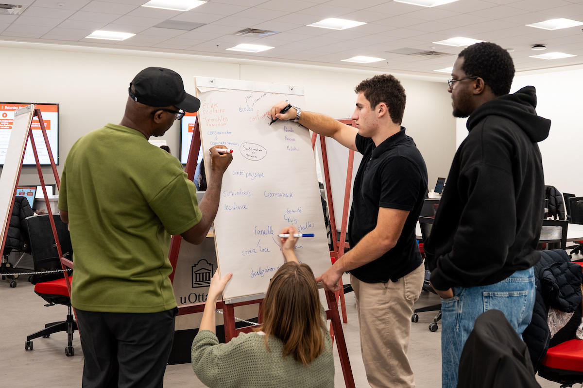 Students working together during interdisciplinary challenge
