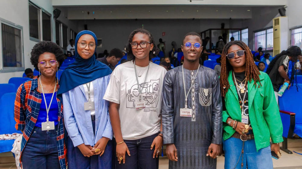 Kady Diarrassouba with four other writing workshop leaders.