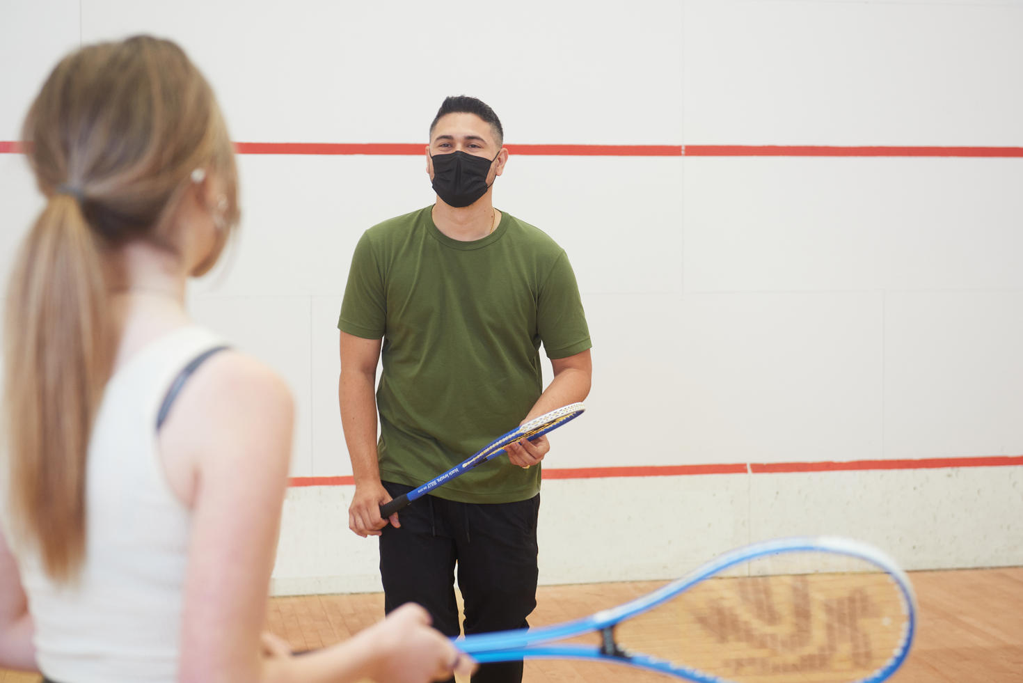 students playing squash