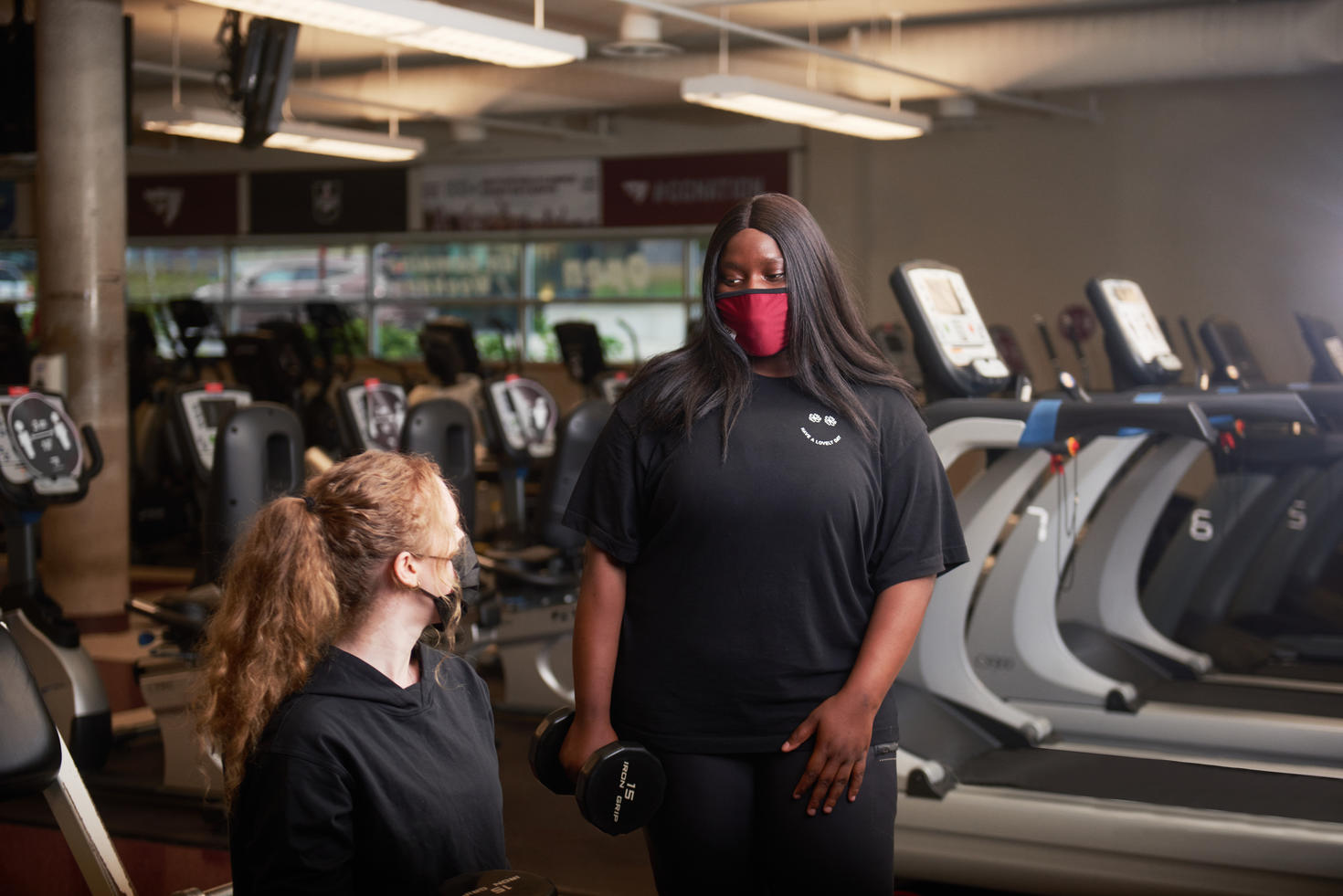 Gym goers conversing